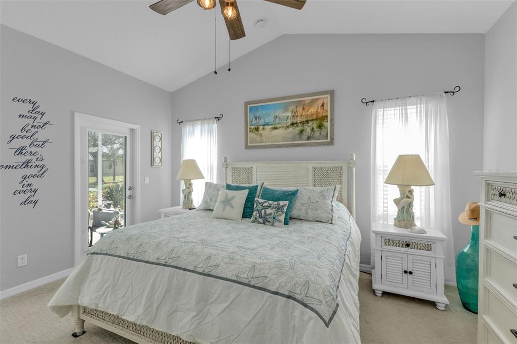 24439 Buckingham Way Punta Gorda, FL 33980 - Photo 14 of 42 a bedroom with bed and window
