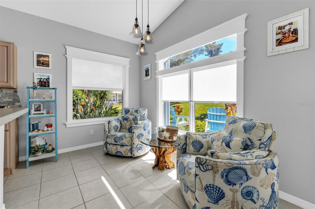 24439 Buckingham Way Punta Gorda, FL 33980 - Photo 16 of 42 a living room with furniture and a flat screen tv