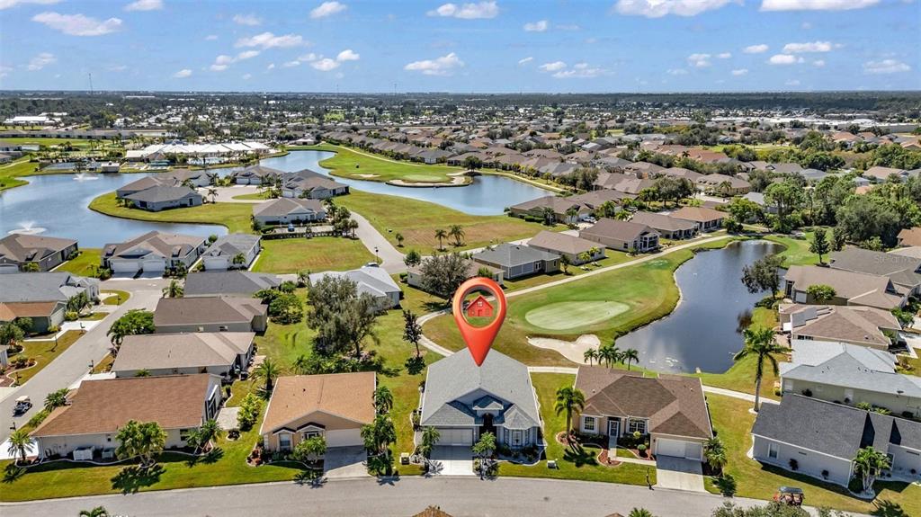24439 Buckingham Way Punta Gorda, FL 33980 - Photo 20 of 42 an aerial view of residential houses with outdoor space and ocean view