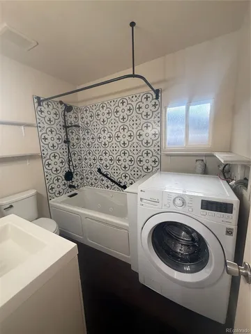 a view of a hallway with stairs