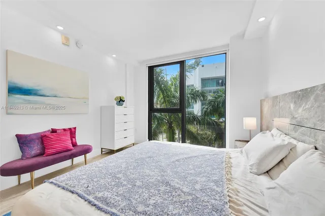 a bed room with a bed and a couch