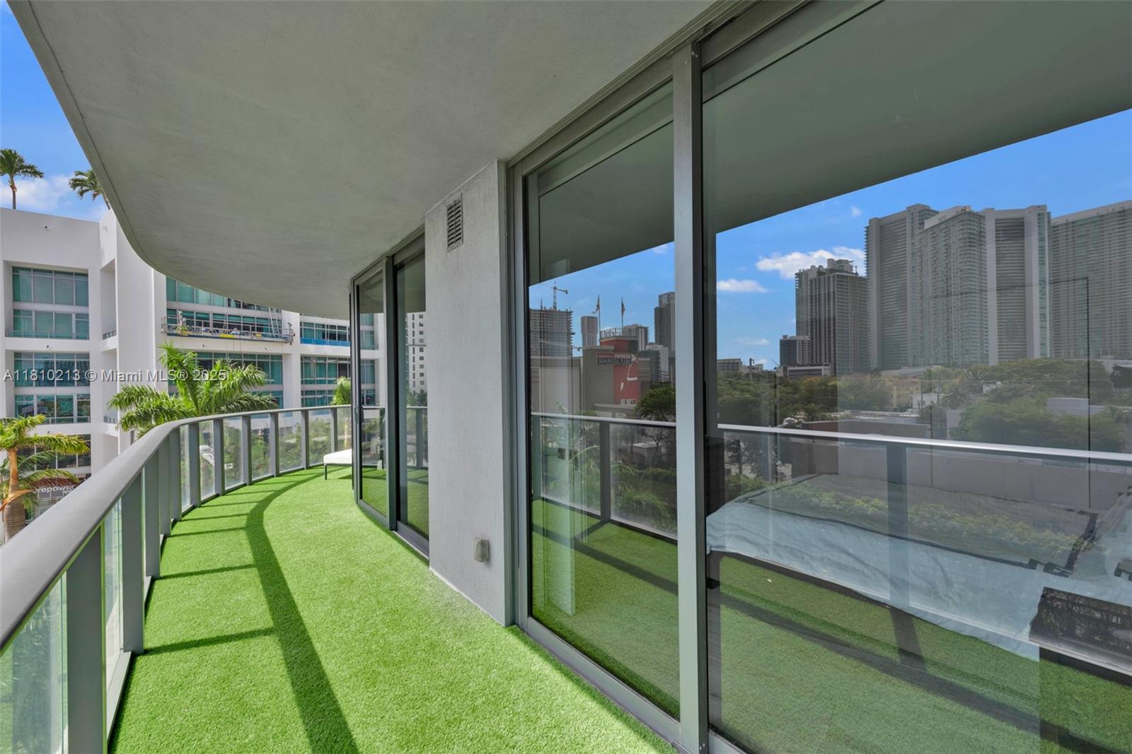 121 Northeast 34th Street, Unit L304 Miami, FL 33137 - Photo 28 of 36 a view of a balcony with staircase