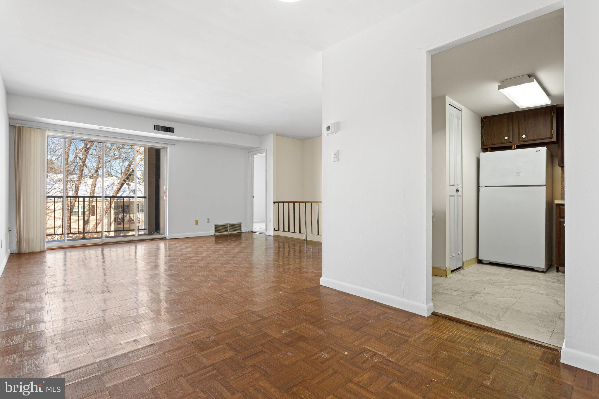 318 Old Forge Crossing, Unit 318 Devon, PA 19333 - Photo 4 of 19 Living Room/Kitchen