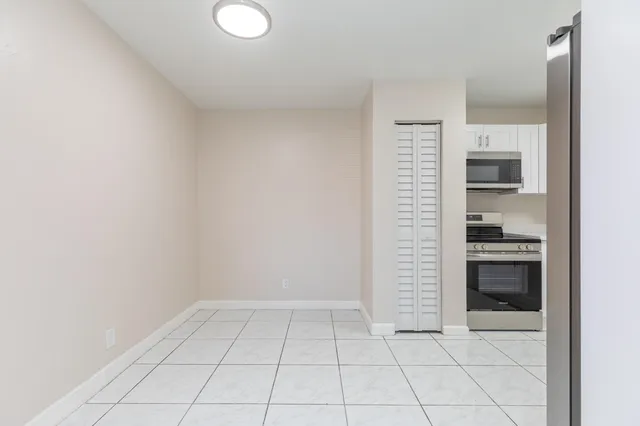 a view of kitchen and hallway
