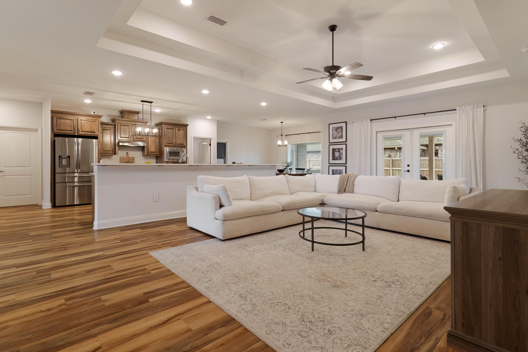 9180 Tara Circle Milton, FL 32583 - Photo 14 of 56 a living room with furniture and kitchen view