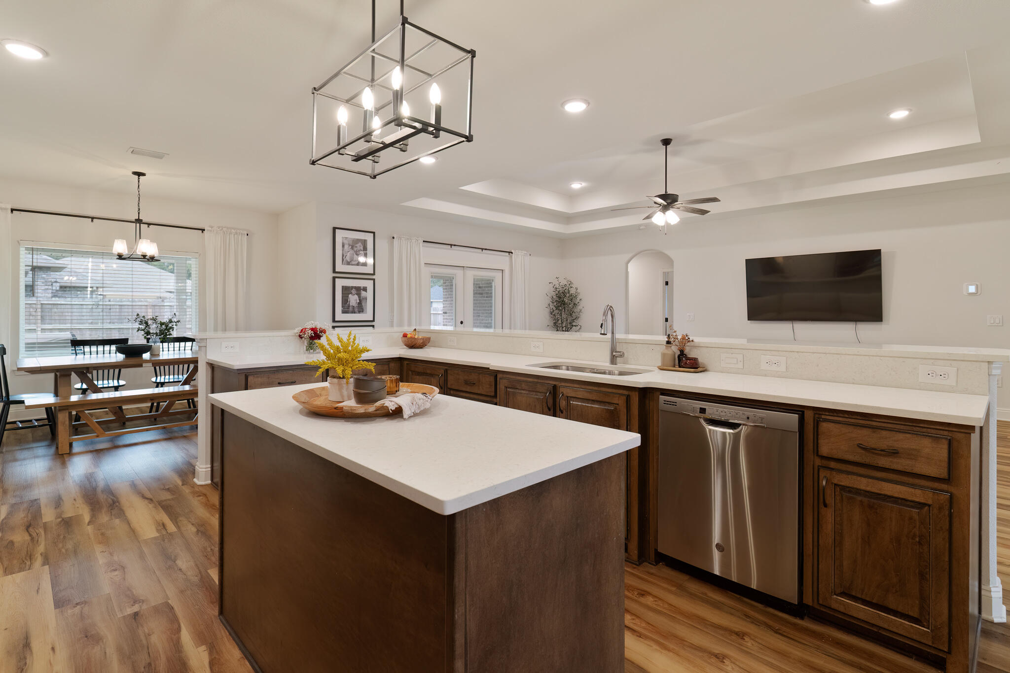 9180 Tara Circle Milton, FL 32583 - Photo 17 of 56 a kitchen with a sink cabinets and wooden floor