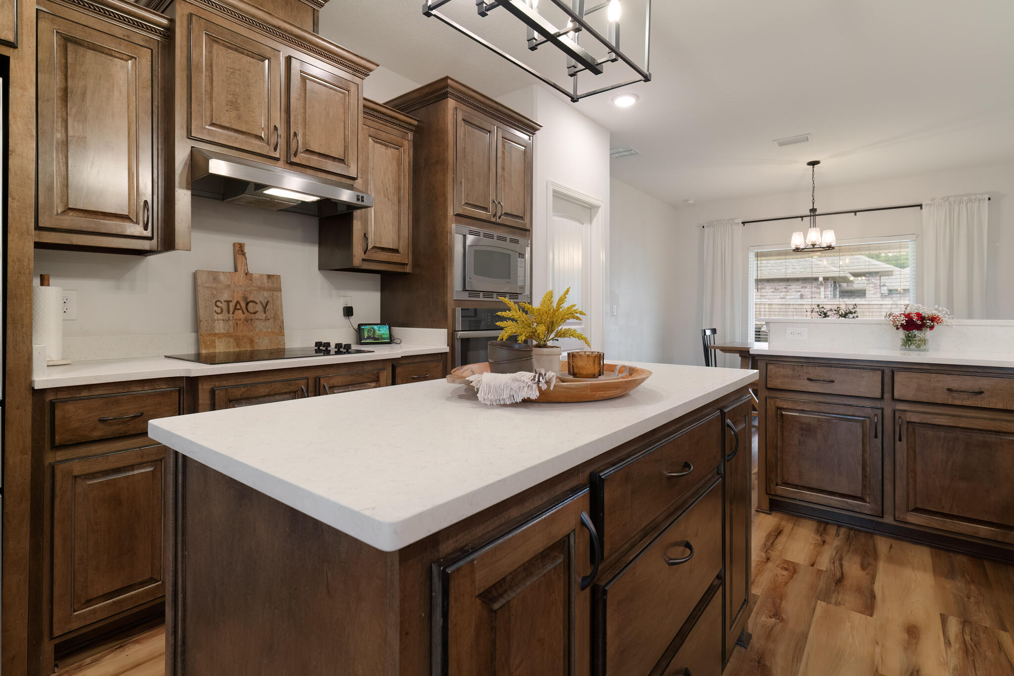 9180 Tara Circle Milton, FL 32583 - Photo 21 of 56 a kitchen with a sink a stove and cabinets