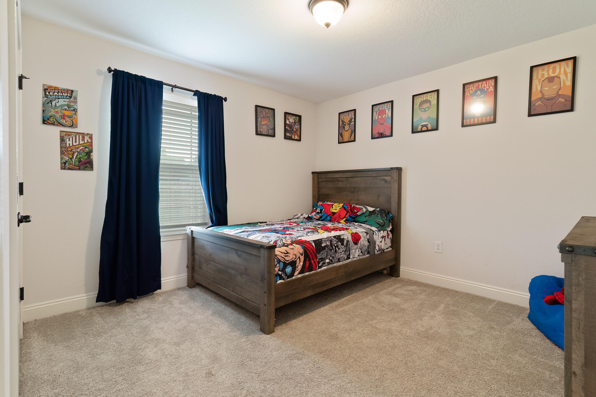 9180 Tara Circle Milton, FL 32583 - Photo 35 of 56 a bedroom with a bed and wall painting