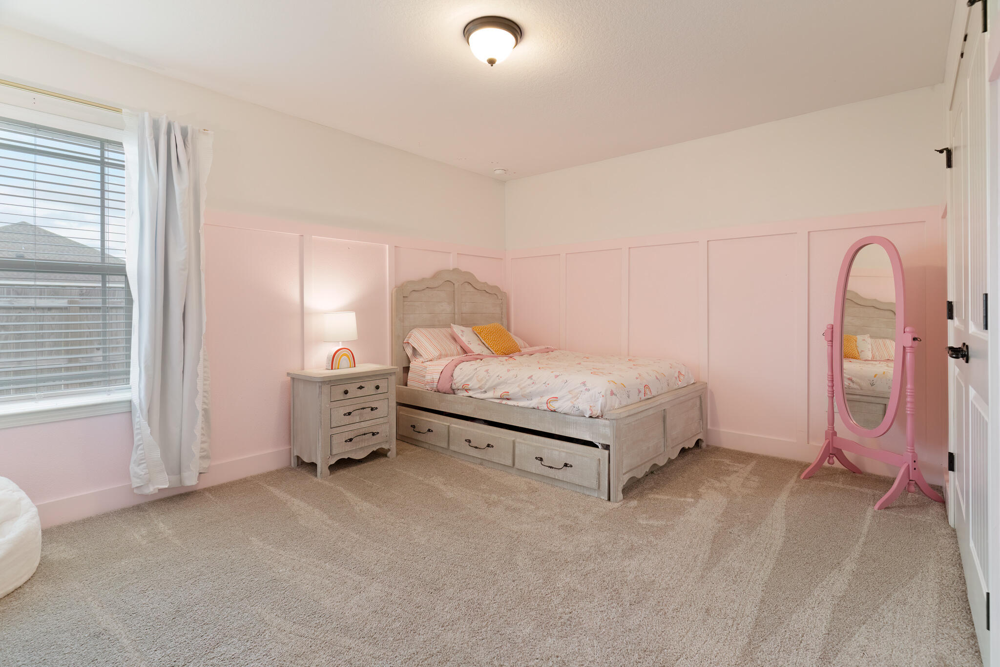 9180 Tara Circle Milton, FL 32583 - Photo 37 of 56 a spacious bedroom with a bed and a cabinets