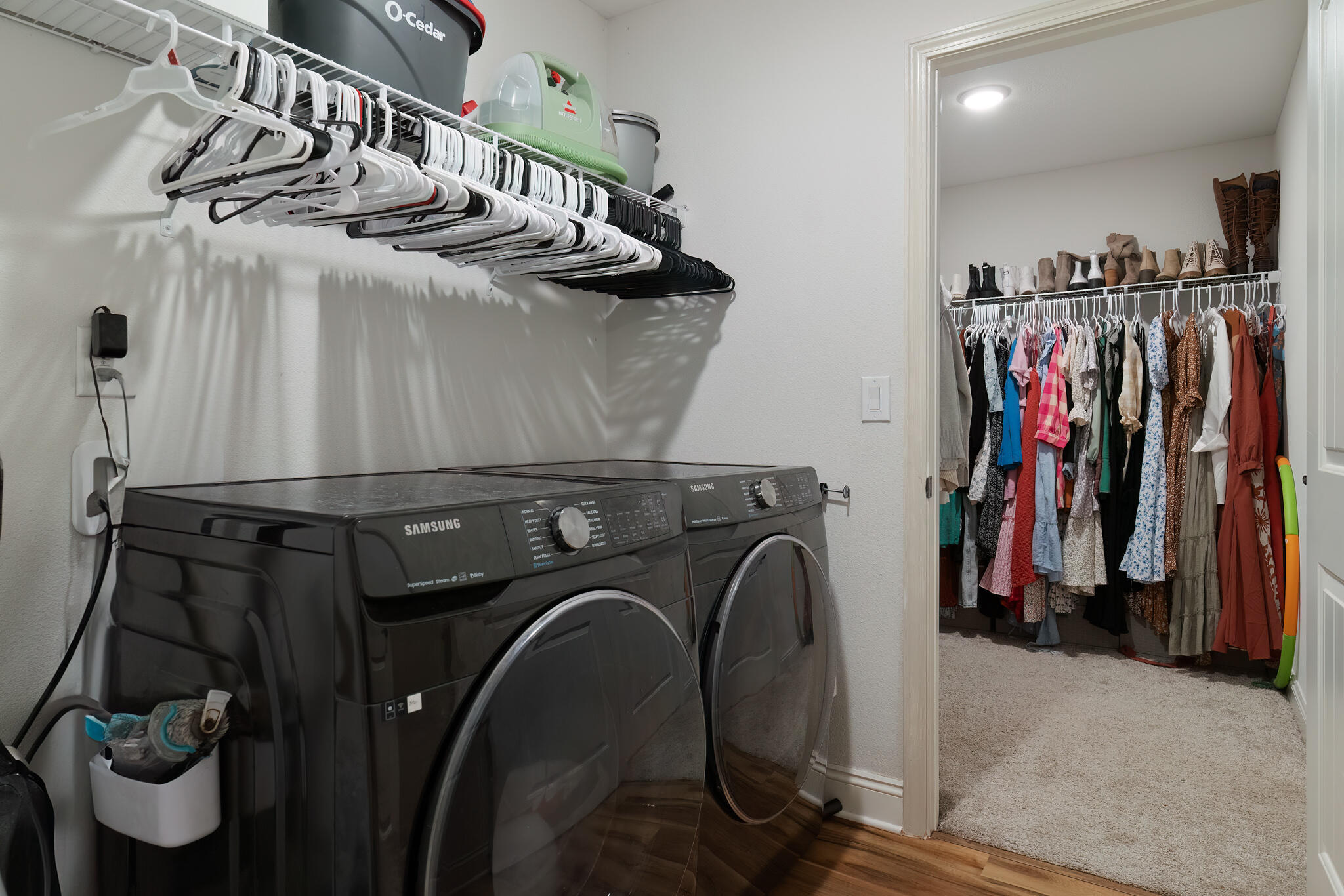 9180 Tara Circle Milton, FL 32583 - Photo 41 of 56 a view of walk in closet with clothes and shoes