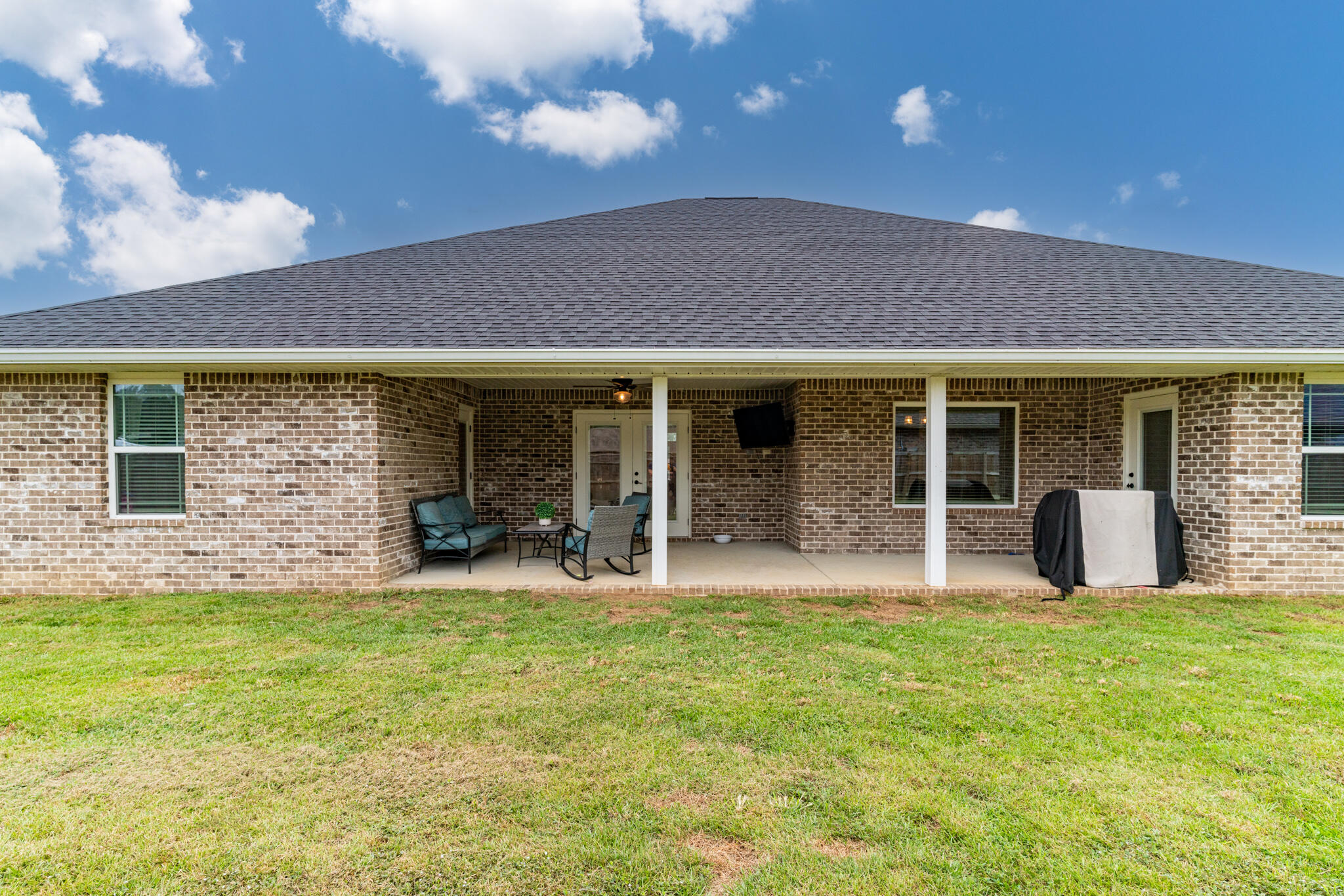 9180 Tara Circle Milton, FL 32583 - Photo 46 of 56 a house view with a garden space