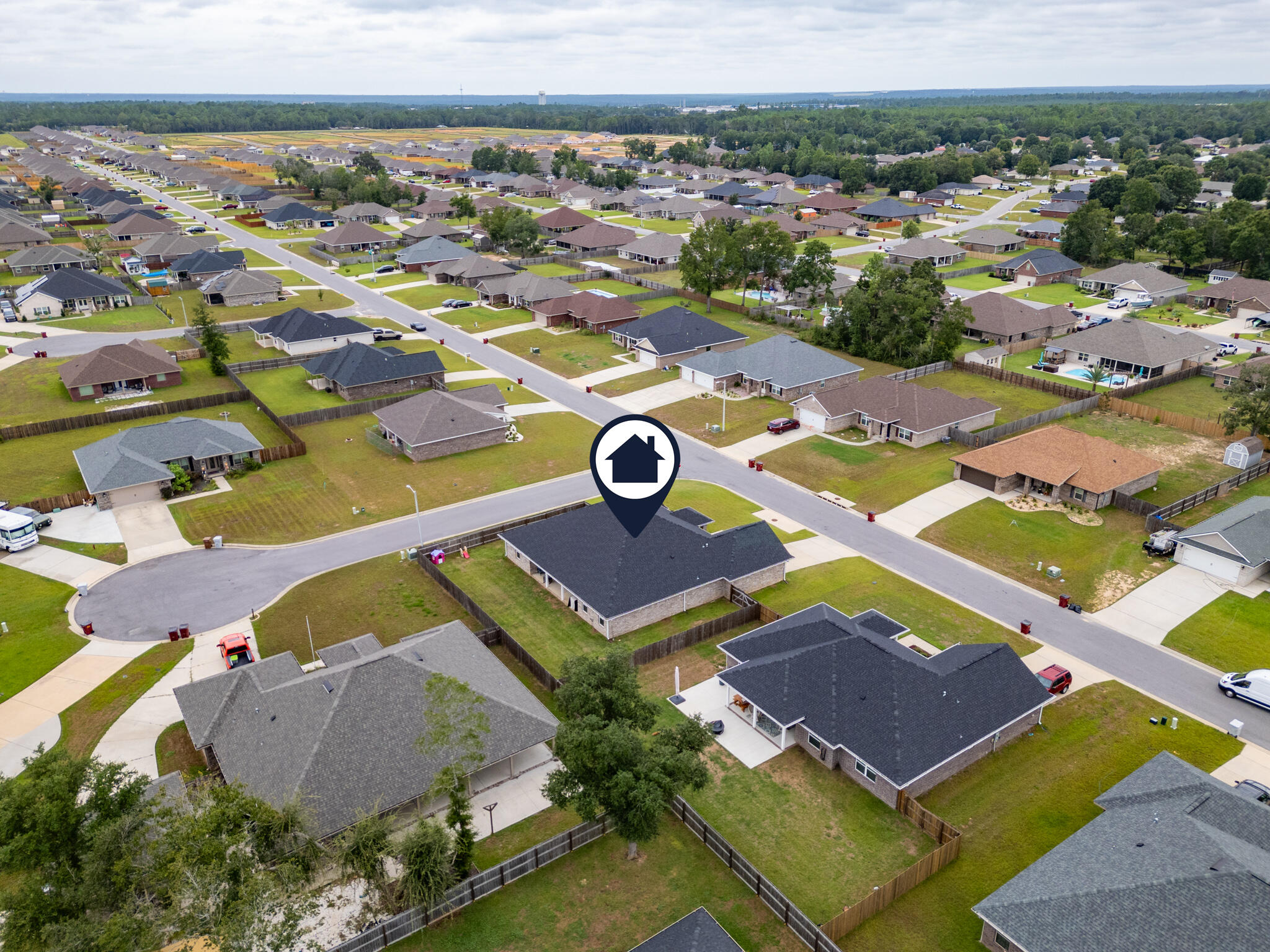 9180 Tara Circle Milton, FL 32583 - Photo 55 of 56 an aerial view of a pool patio and mountain view