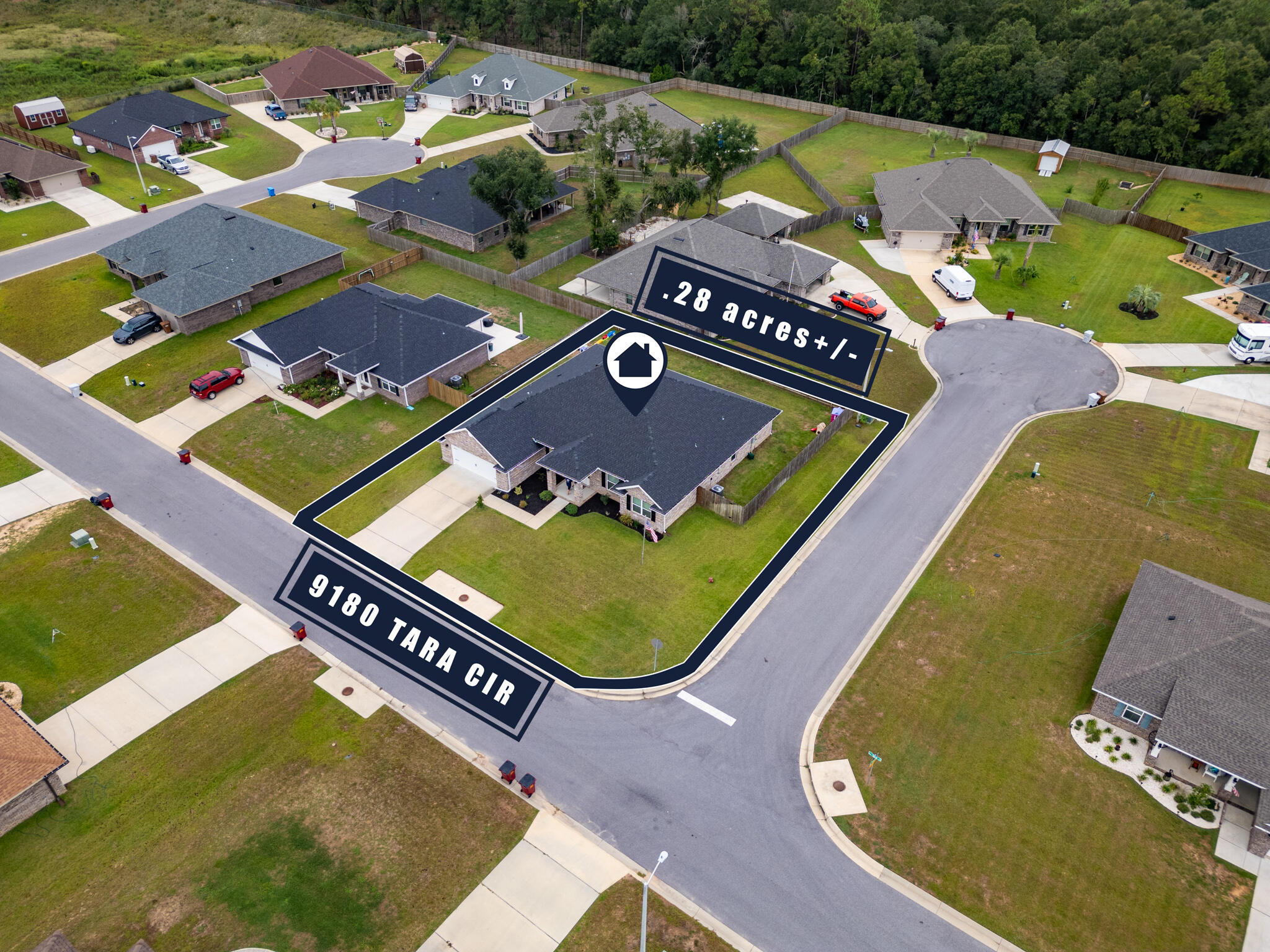 9180 Tara Circle Milton, FL 32583 - Photo 56 of 56 an aerial view of a pool yard patio and outdoor kitchen