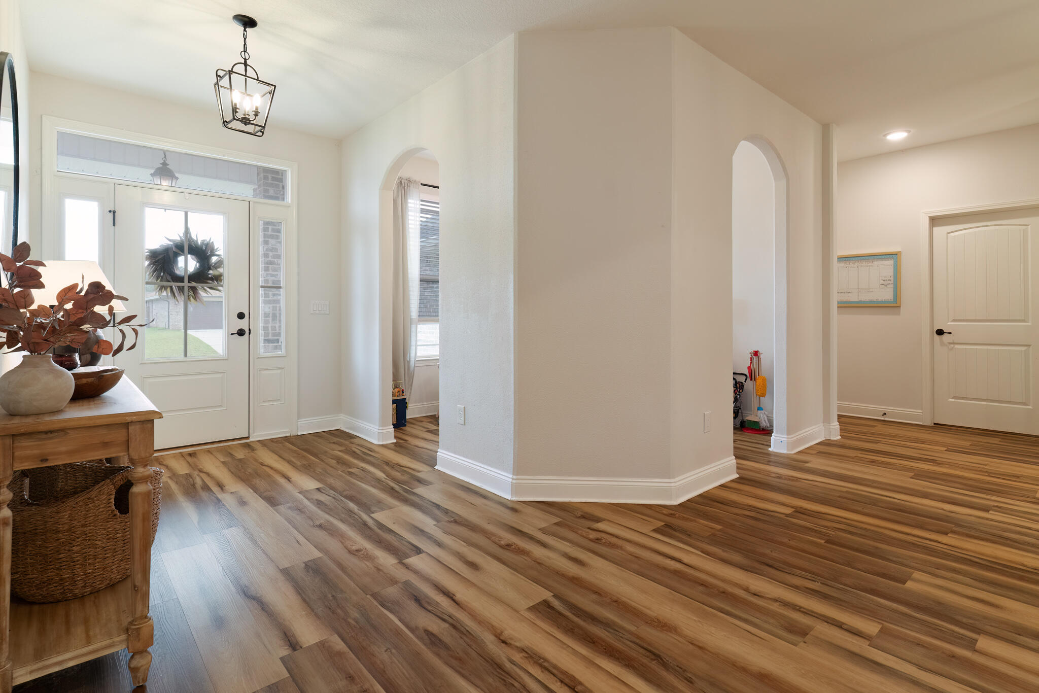 9180 Tara Circle Milton, FL 32583 - Photo 8 of 56 a view of livingroom with furniture and wooden floor