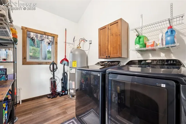 a kitchen with stainless steel appliances granite countertop a stove and a refrigerator