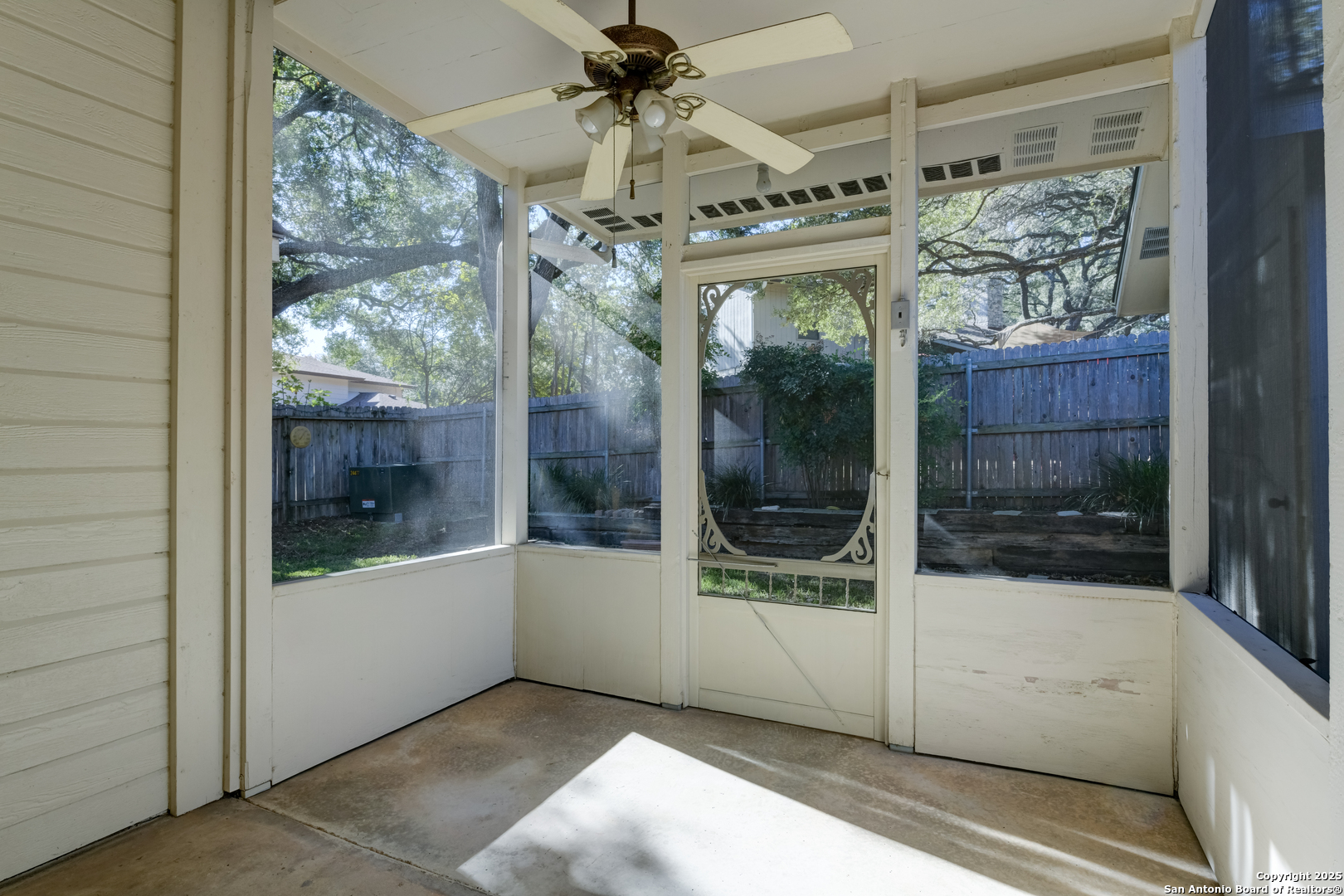 9923 Tezel Road San Antonio, TX 78254 - Photo 28 of 30 a view of a glass door with a glass door and a glass door