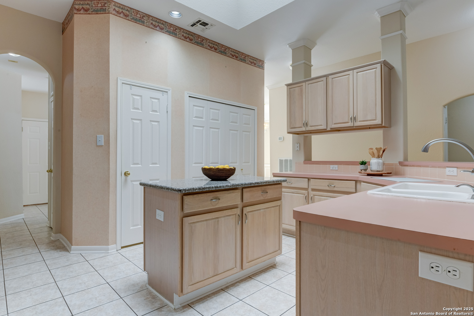 9923 Tezel Road San Antonio, TX 78254 - Photo 7 of 30 a kitchen with a sink and cabinets