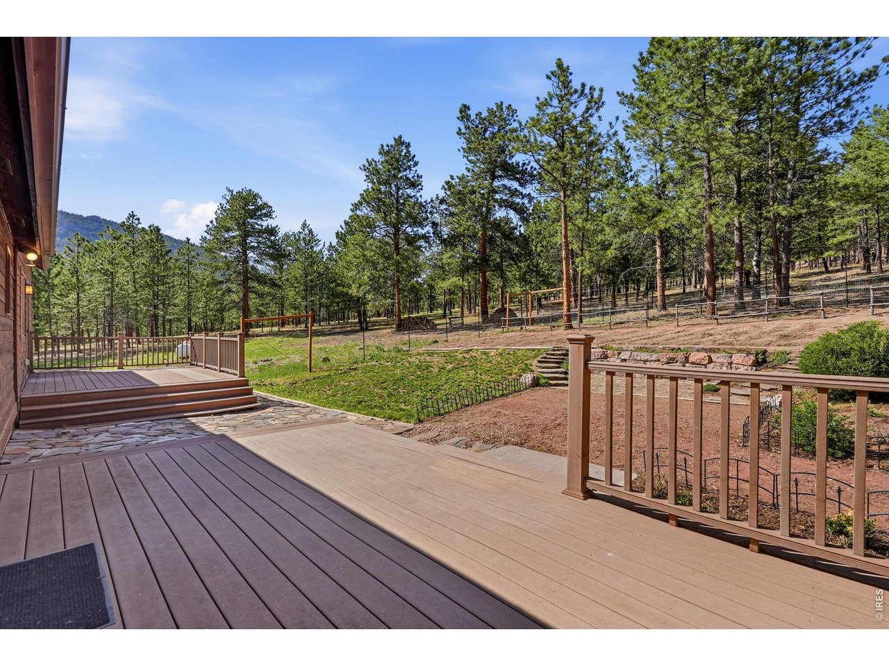 560 Quillan Gulch Road Loveland, CO 80537 - Photo 33 of 49 Fenced in terraced gardens ready for all your summer gardening!