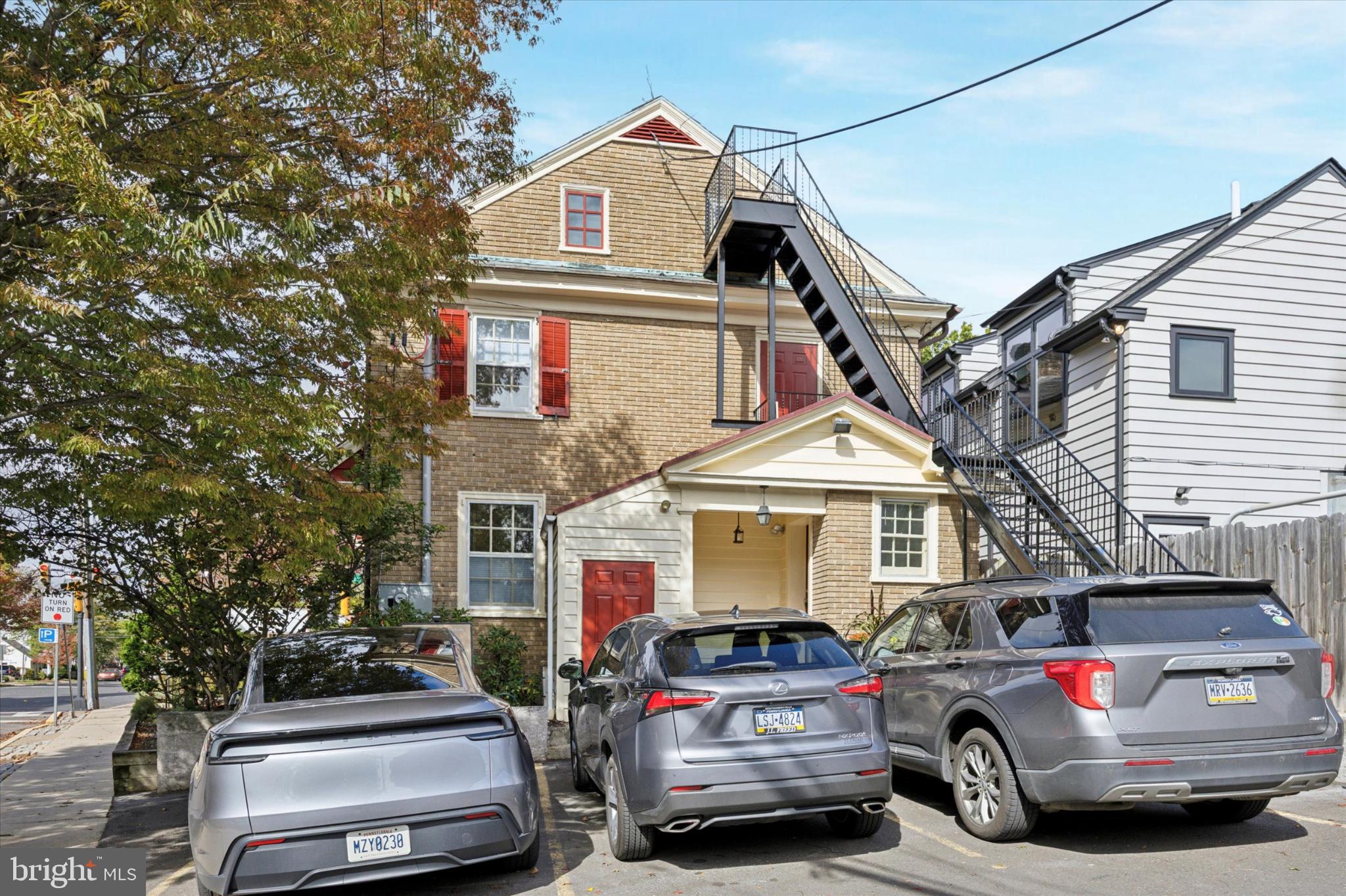 21 South Clinton Street, Unit 2 Doylestown, PA 18901 - Photo 13 of 13 Charming brick residence with modern appeal.