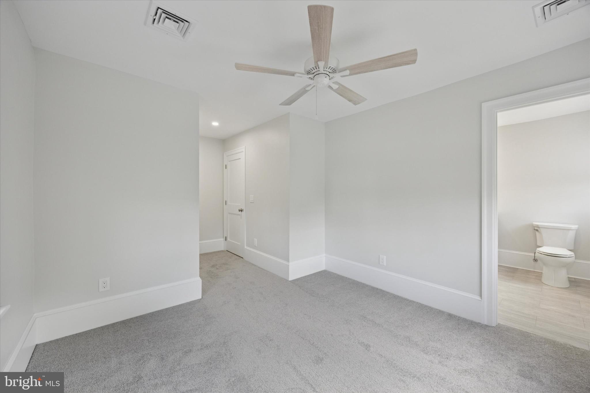 21 South Clinton Street, Unit 2 Doylestown, PA 18901 - Photo 6 of 13 Bright and airy room with modern finishes.