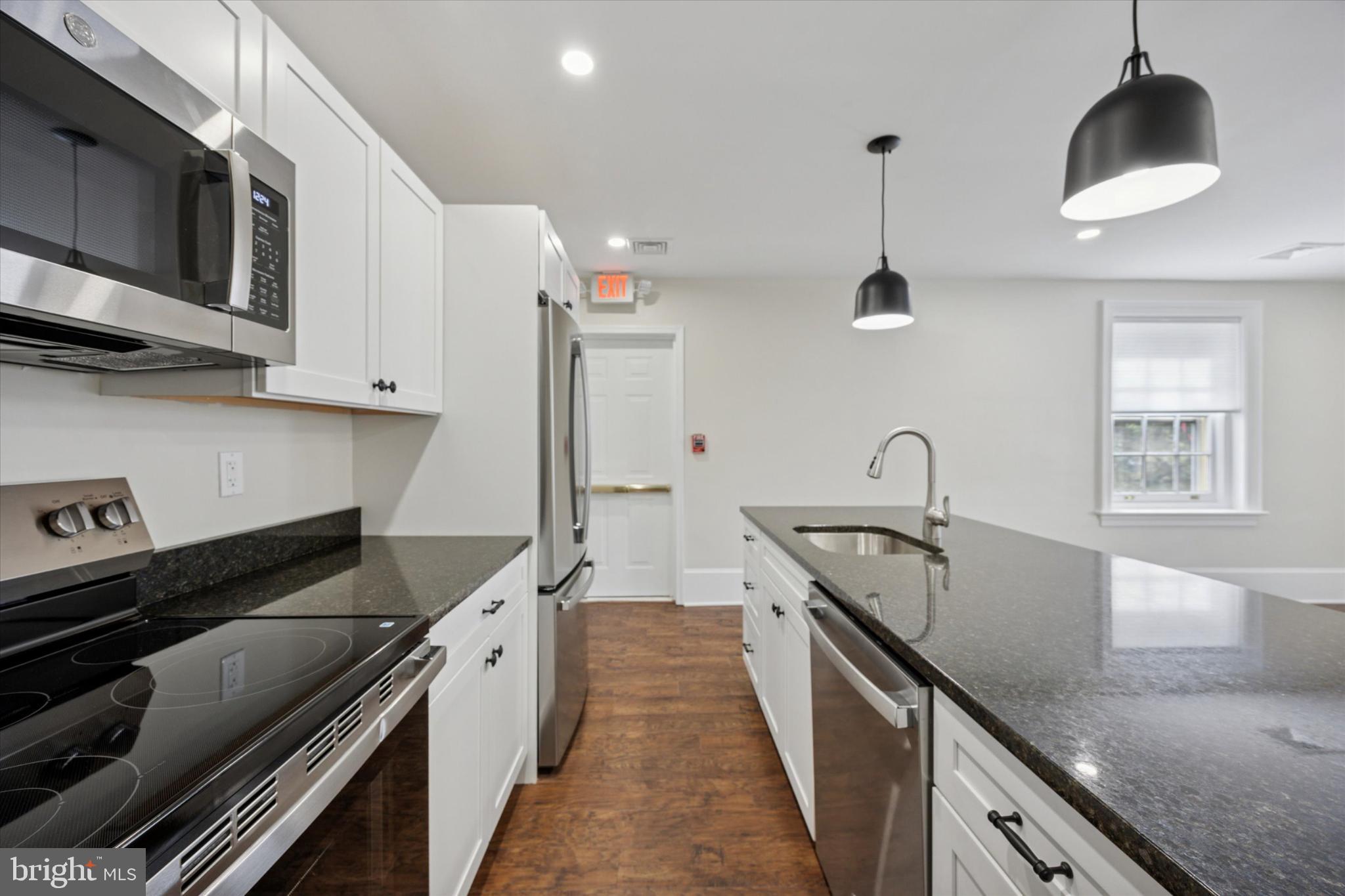 21 South Clinton Street, Unit 2 Doylestown, PA 18901 - Photo 10 of 13 Modern kitchen with sleek finishes.