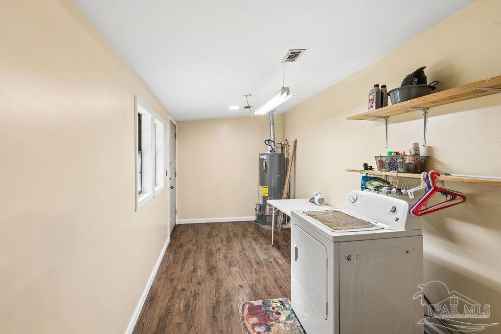 8938 Pioneer Road Holt, FL 32564 - Photo 27 of 44 a room with storage and utility