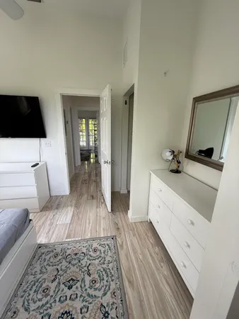 a living room with a couch and a flat screen tv