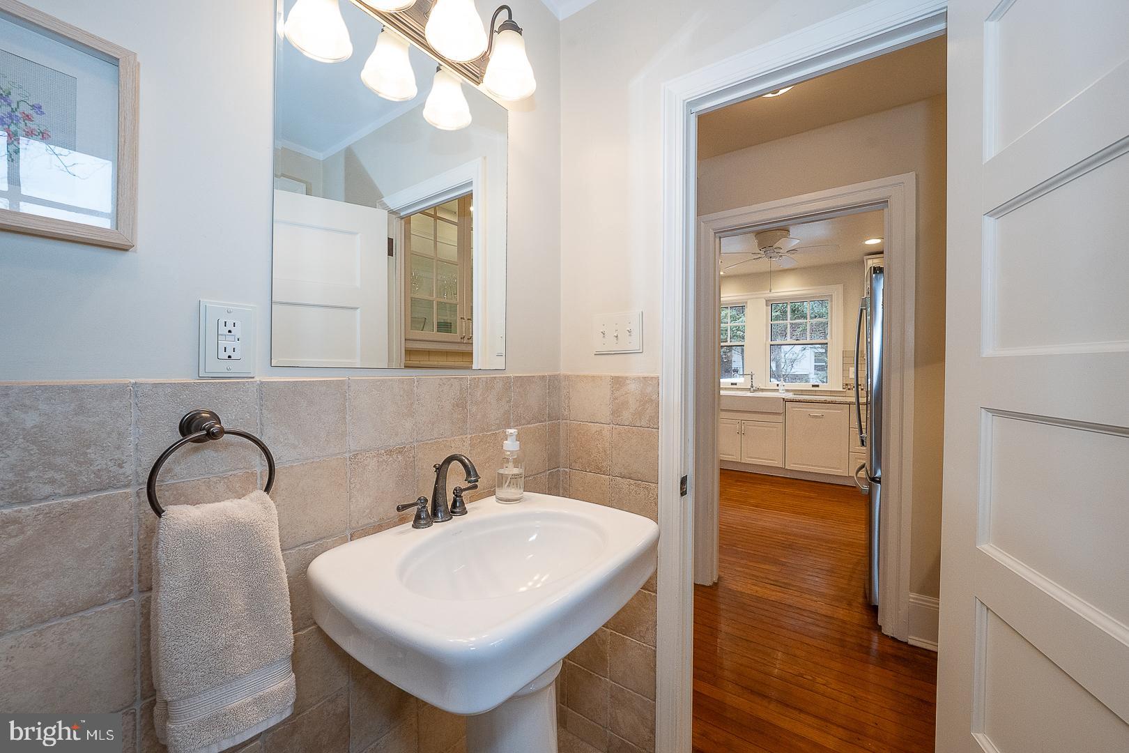 124 Grandview Road Ardmore, PA 19003 - Photo 17 of 65 a bathroom with a sink and a mirror