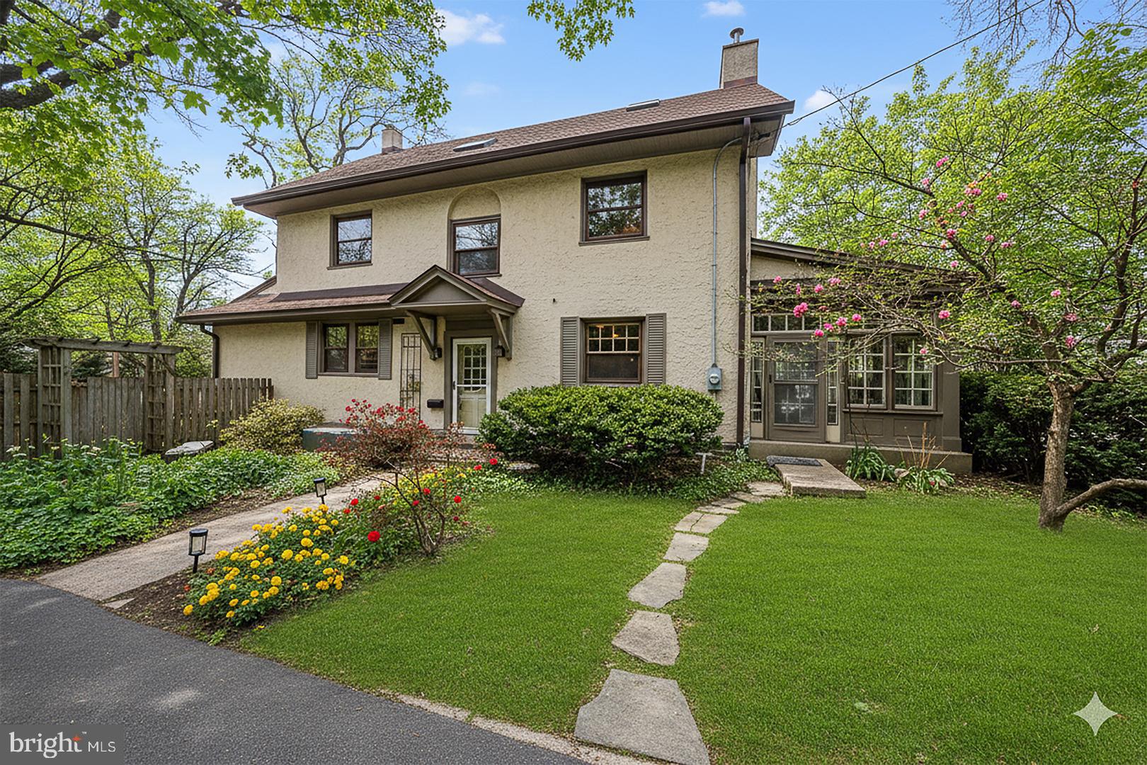124 Grandview Road Ardmore, PA 19003 - Photo 2 of 65 a front view of a house with a garden