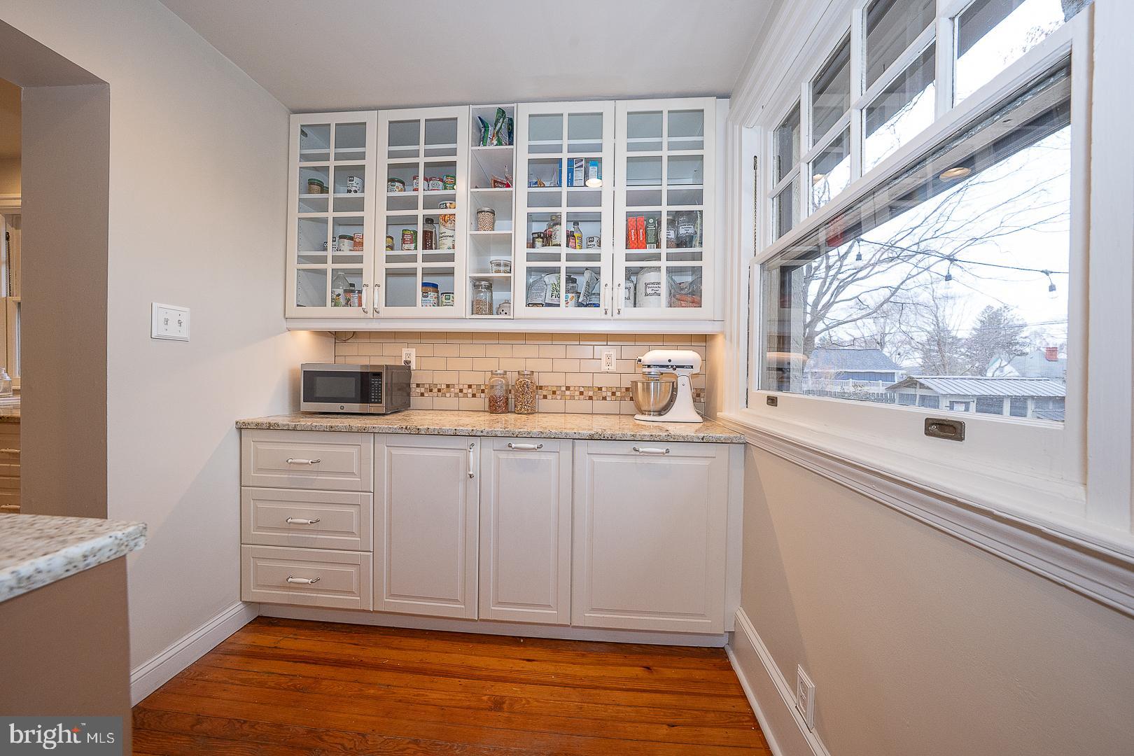 124 Grandview Road Ardmore, PA 19003 - Photo 24 of 65 a kitchen with granite countertop a sink and a window