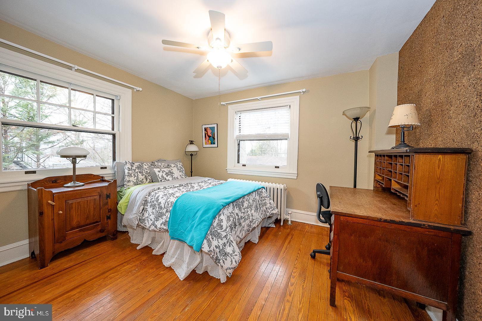 124 Grandview Road Ardmore, PA 19003 - Photo 34 of 65 a bedroom with a bed and wooden floor