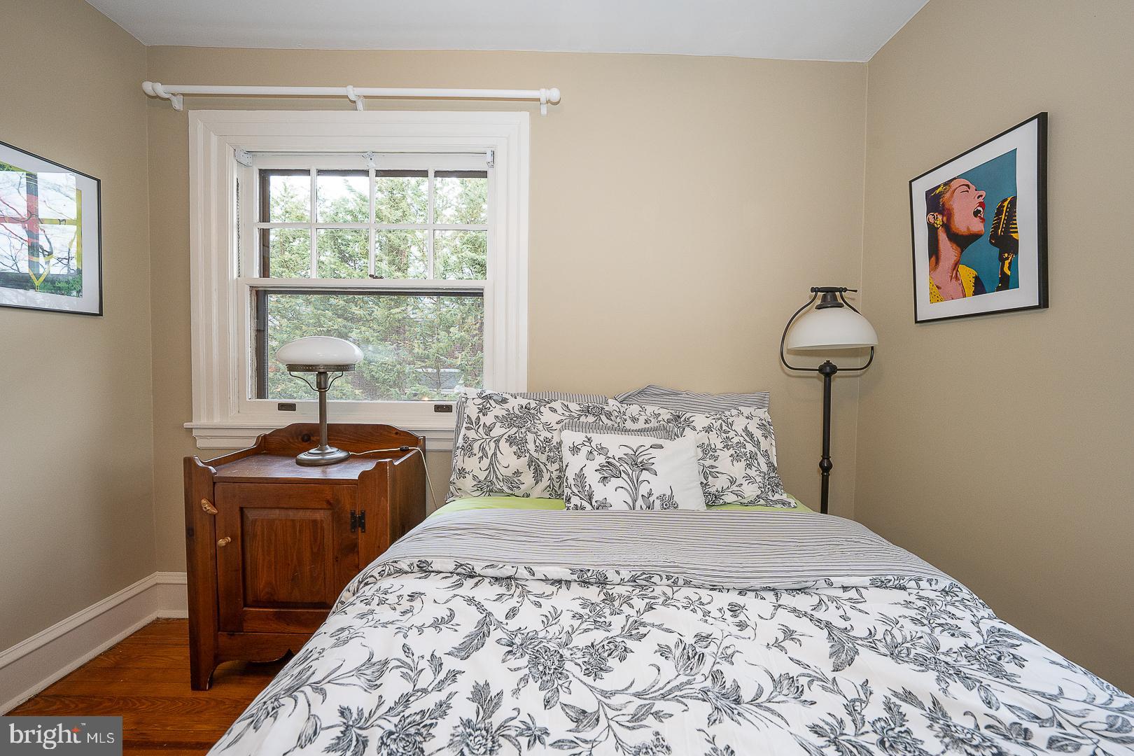 124 Grandview Road Ardmore, PA 19003 - Photo 35 of 65 a bedroom with a bed and wooden floor