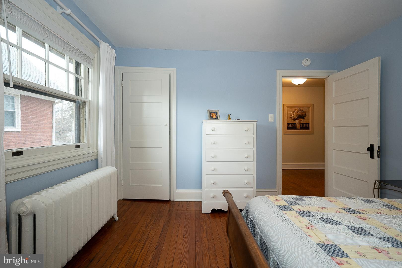 124 Grandview Road Ardmore, PA 19003 - Photo 37 of 65 a bedroom with a bed and a window