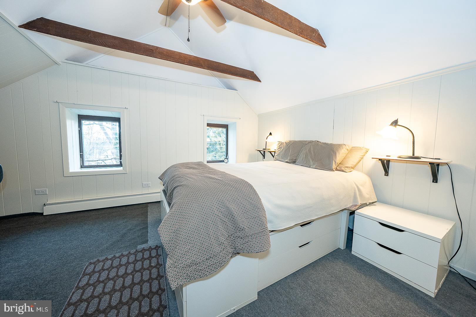 124 Grandview Road Ardmore, PA 19003 - Photo 38 of 65 a spacious bedroom with a bed and a window