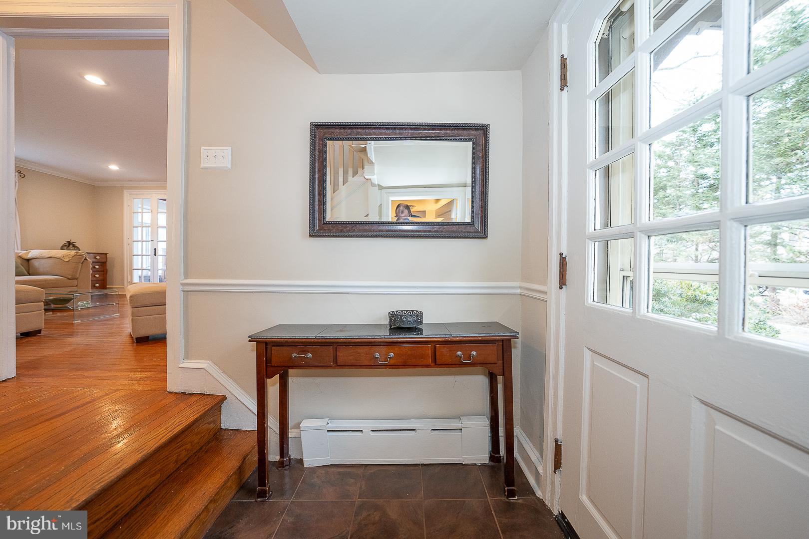 124 Grandview Road Ardmore, PA 19003 - Photo 4 of 65 a living room with furniture and a fireplace