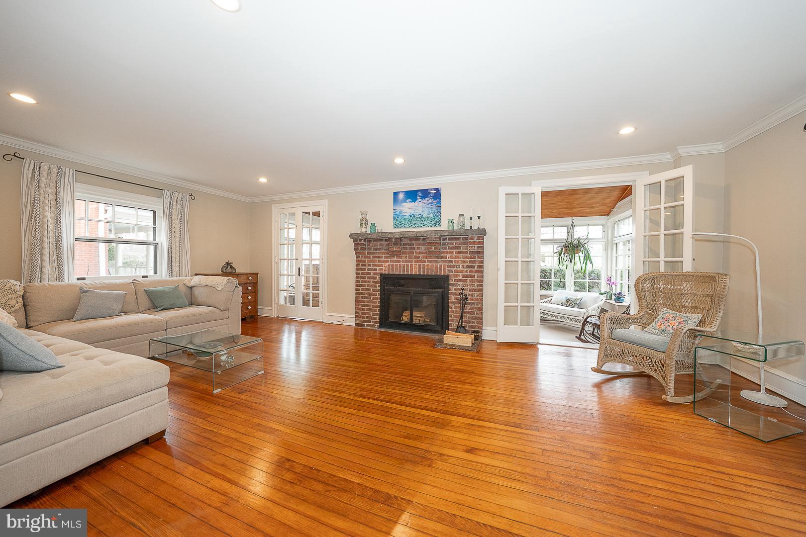 124 Grandview Road Ardmore, PA 19003 - Photo 7 of 65 a living room with furniture and a fireplace