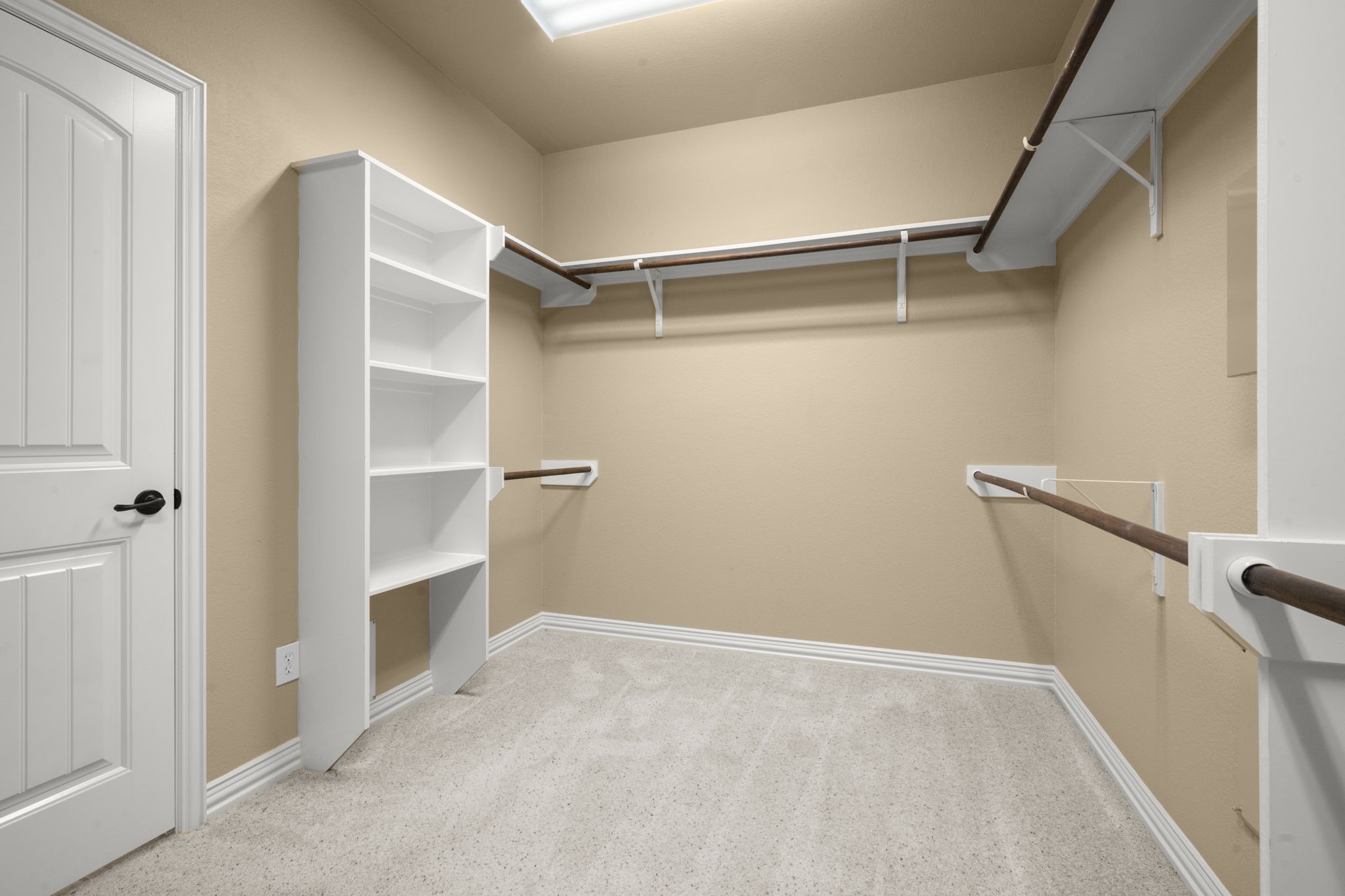 110 David Forest Lane Conroe, TX 77384 - Photo 35 of 35 a view of walk in closet with empty racks