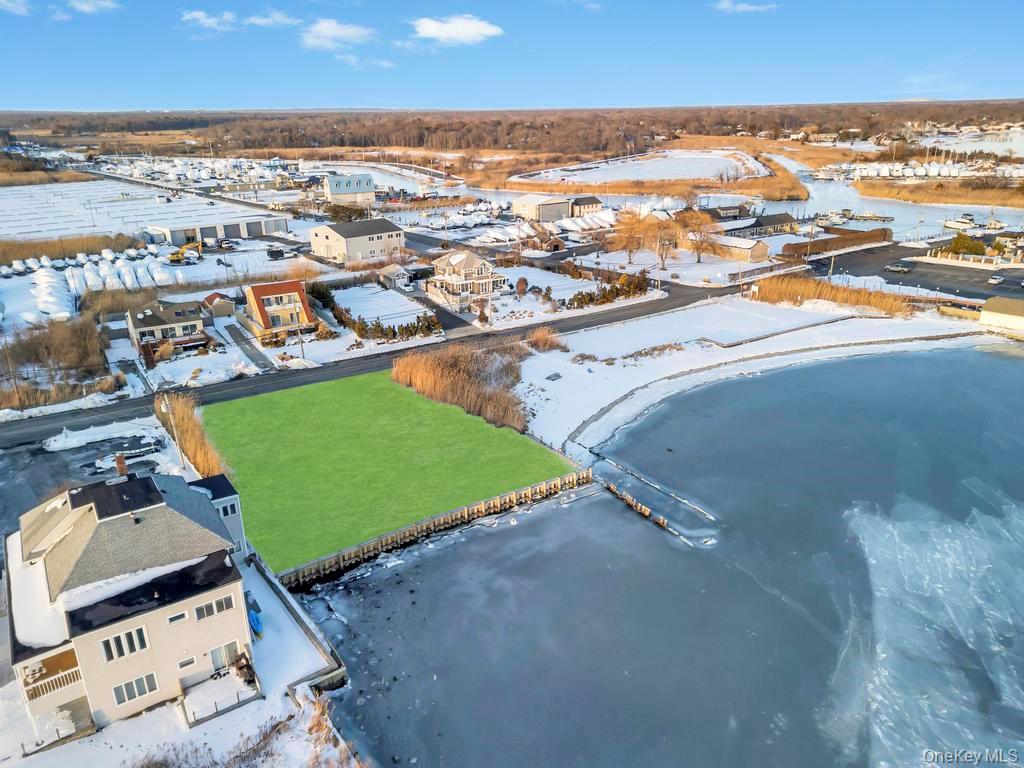 48-52 Browns River Road Sayville, NY 11782 - Photo 4 of 9 an aerial view of residential houses with outdoor space