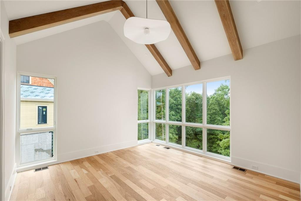 1064 Lupo Loop Chattahoochee Hills, GA 30268 - Photo 20 of 40 a view of an empty room with a window