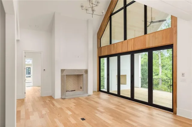 a view of an entryway with a floor to ceiling window