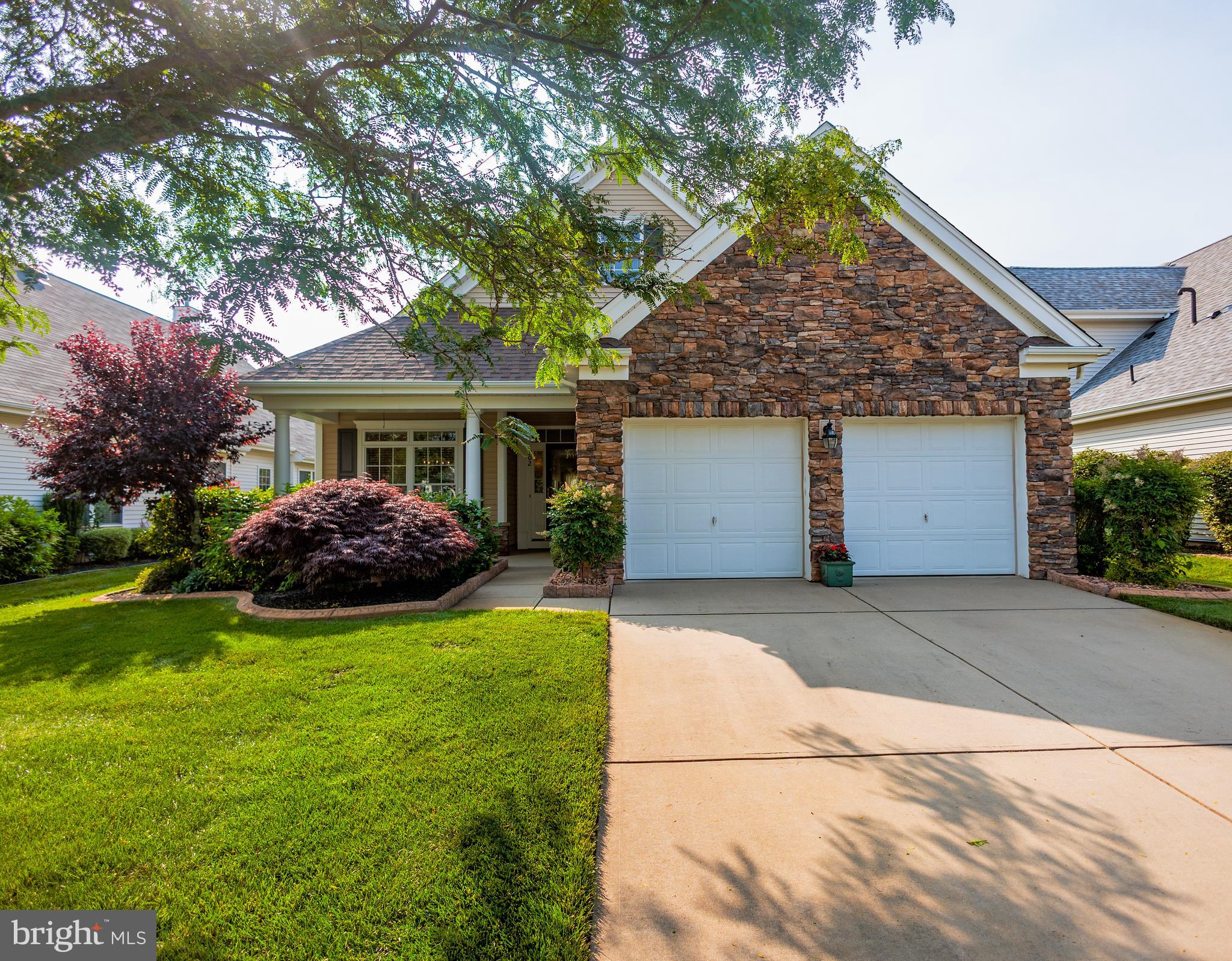 a house view with a garden space