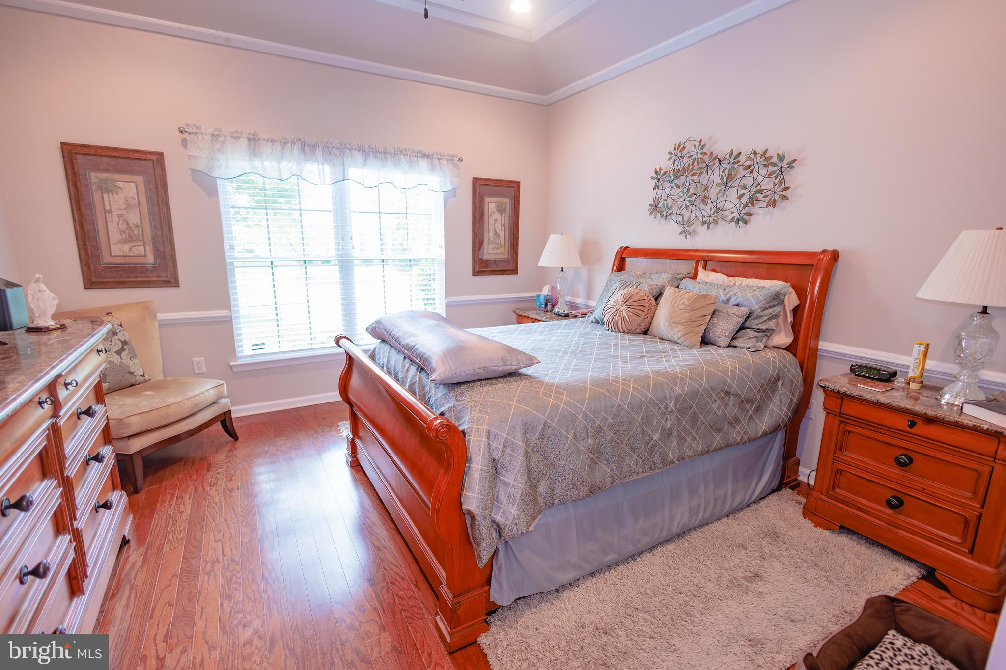 302 Gosling Way Glassboro, NJ 08028 - Photo 19 of 37 a bedroom with a bed and a couch