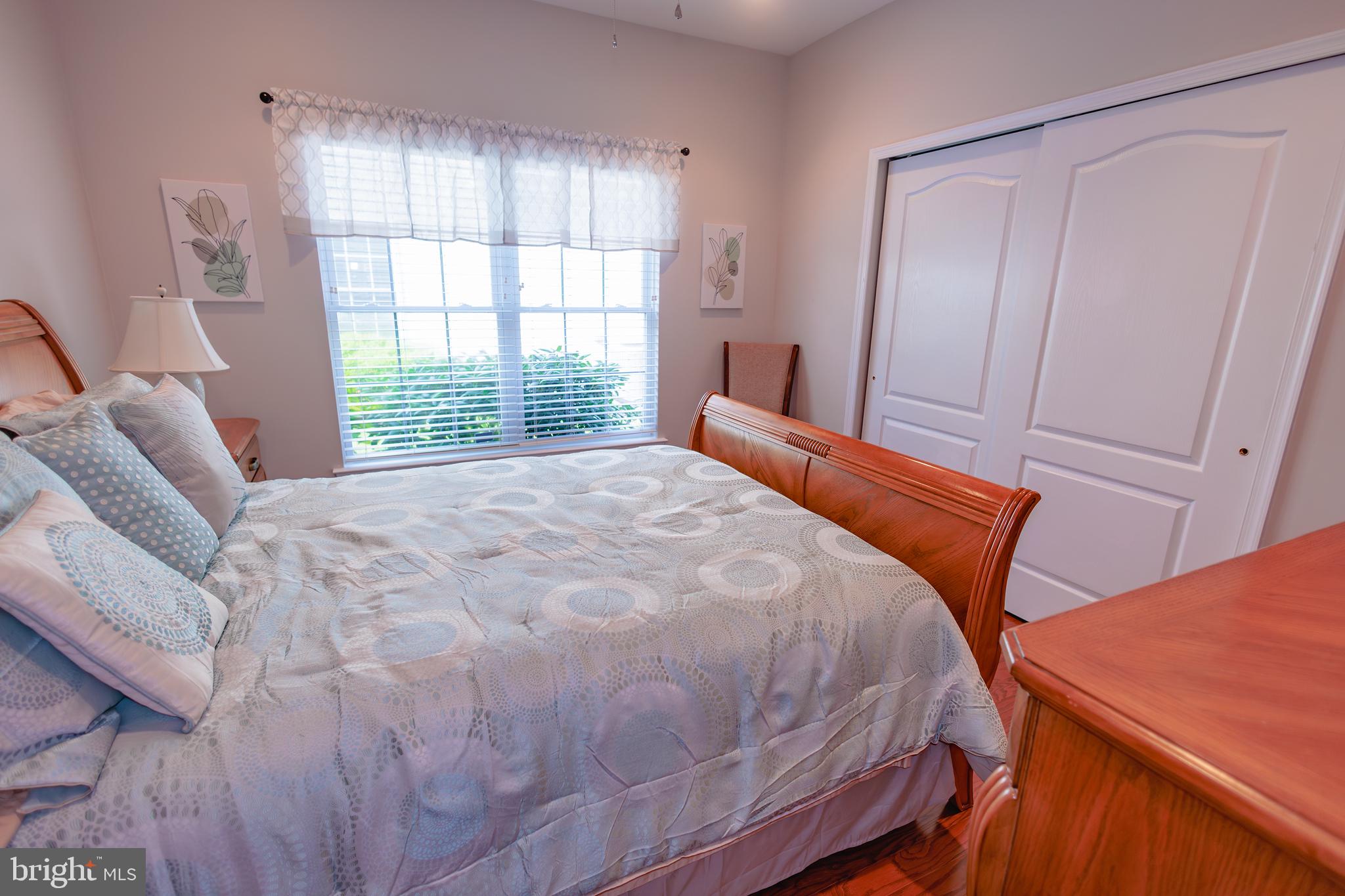302 Gosling Way Glassboro, NJ 08028 - Photo 26 of 37 a bed sitting in a bedroom next to a window