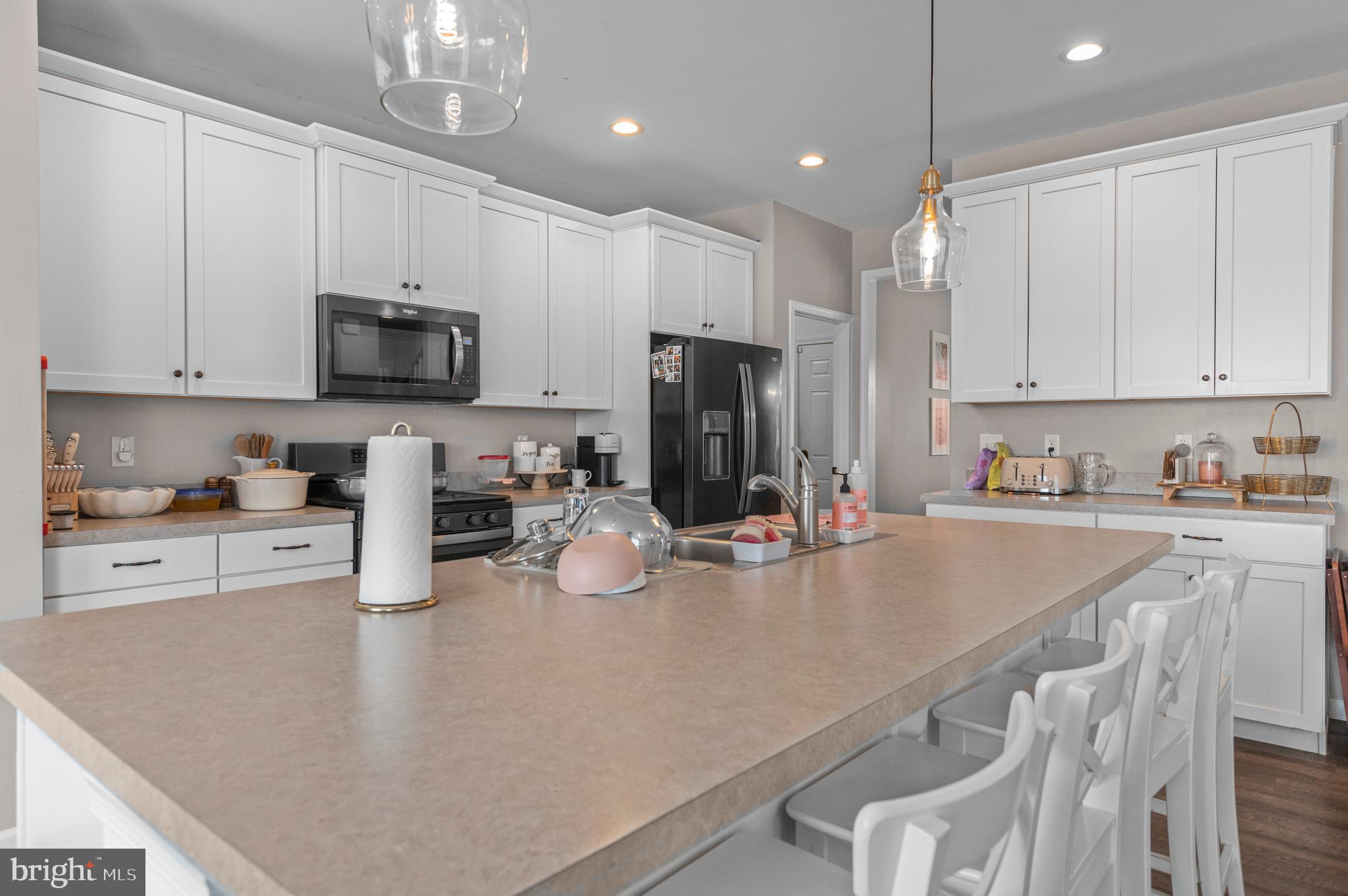 2004 Prout Farm Road Pottstown, PA 19464 - Photo 2 of 53 a kitchen with kitchen island granite countertop stainless steel appliances sink microwave and cabinets