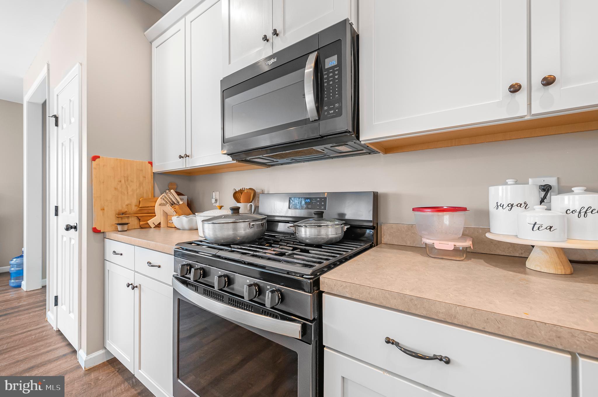 2004 Prout Farm Road Pottstown, PA 19464 - Photo 6 of 53 a kitchen with stainless steel appliances a stove a microwave cabinets and a refrigerator