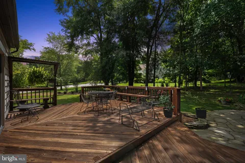 a view of swimming pool with a patio