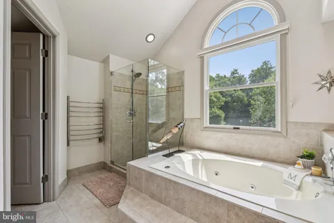 a view of a hallway with washer and dryer