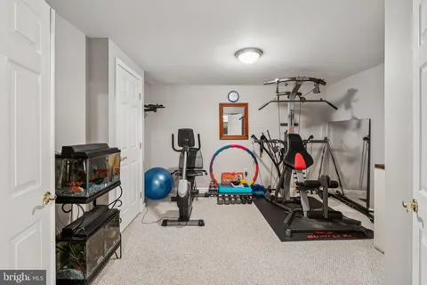 a room with furniture and a flat screen tv