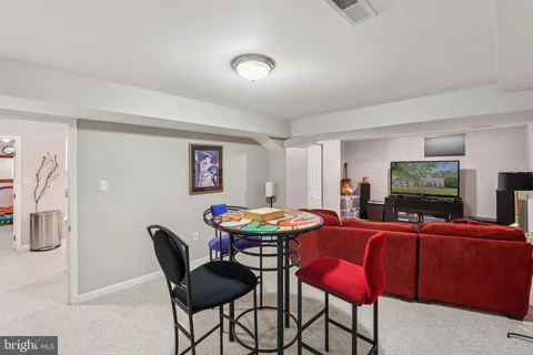a living room with furniture and a couch