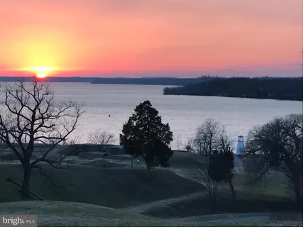 a view of a room with lots of gym equipment